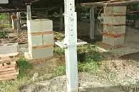 Steel support piers and anchoring under a manufactured home